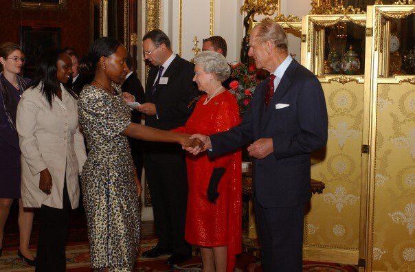 ONGOLO Founder, Muloongo Muchelemba, meeting HM Queen Elizabeth II and HRH Prince Philip at  Buckingham Palace on 20 October 2003. Photo credit: Muloongo Muchelemba