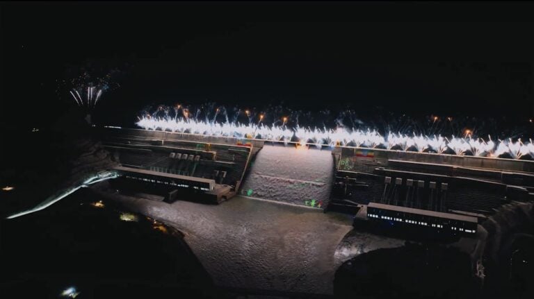 fireworks over a dam